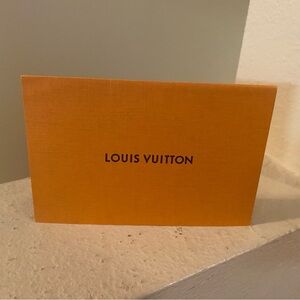 Louis Vuitton Orange Gift Card. Receipt Holder. Excellent Condition.